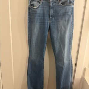 MOTHER The Weekender Mid Rise Flare Jeans.